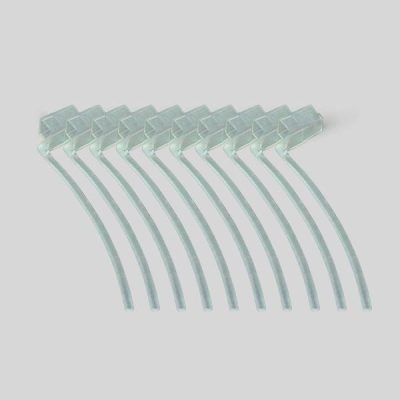 Eight clear plastic zip ties, designed for use with the Concha Lock, are neatly arranged on a light gray background with aligned locking heads and parallel tails extending outward.